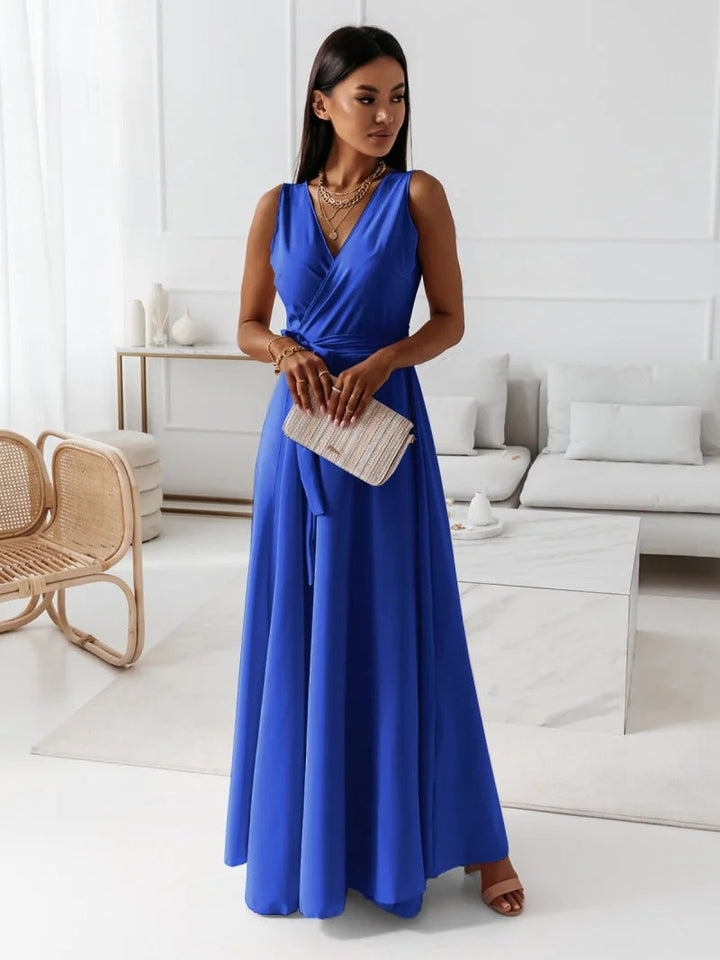 Women's sleeveless wrap maxi dress. Comfortable, flowy design for casual chic or elegant summer party wear.