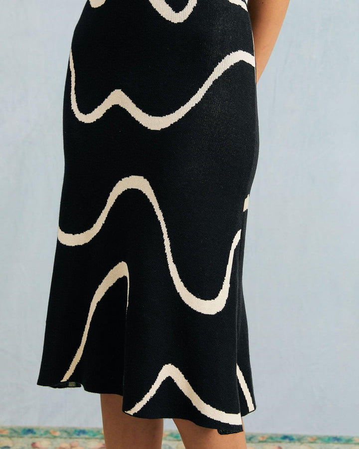 Women's elegant bodycon midi dress featuring a mermaid hem, ideal for evening & party.