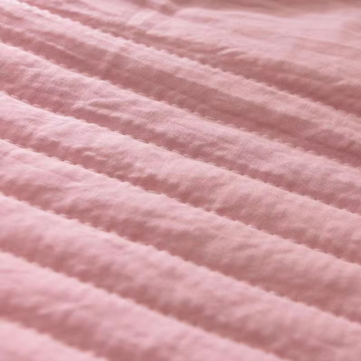 Innovative sleep aid: an ultra-cooling comfort blanket designed to alleviate night sweats & provide summer heat relief.