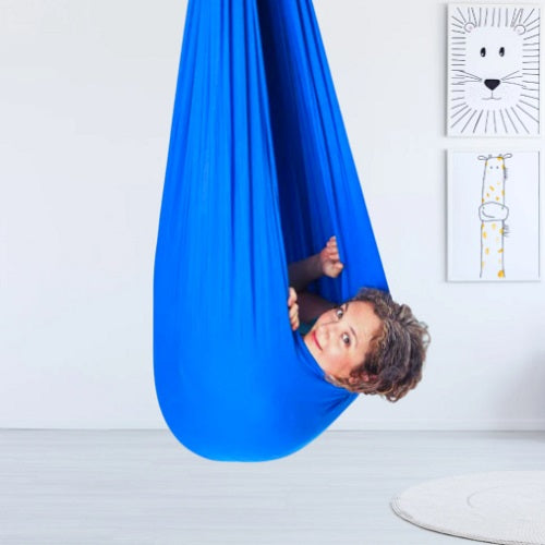 Soft indoor sensory swing for children. Provides deep pressure for calming kids' anxiety & improving focus.