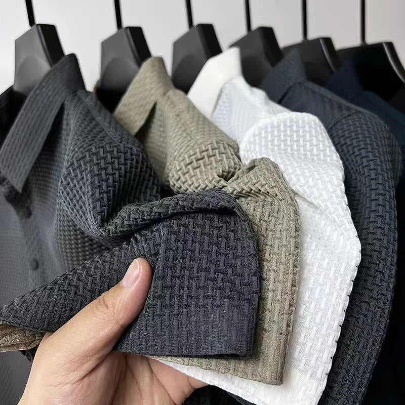 Close-up of men's textured short sleeve polo fabric, comfortable for summer.