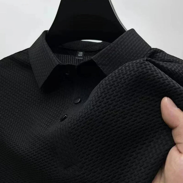 Comfortable regular fit men's textured short sleeve polo, great for everyday wear.