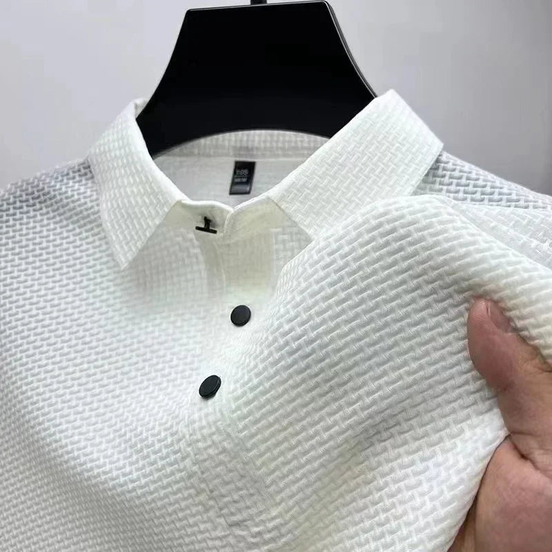 Detail of collar & buttons on a stylish men's textured short sleeve polo shirt.