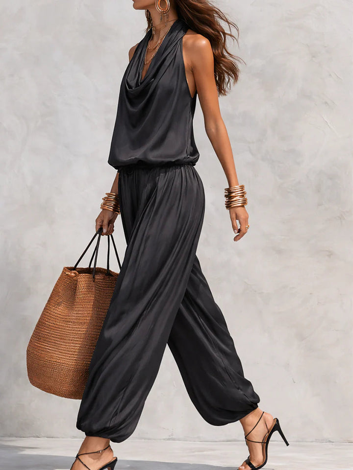 Stylish women's coordinated set: a chic cowl neck halter top and comfortable wide-leg pants for an elegant look.