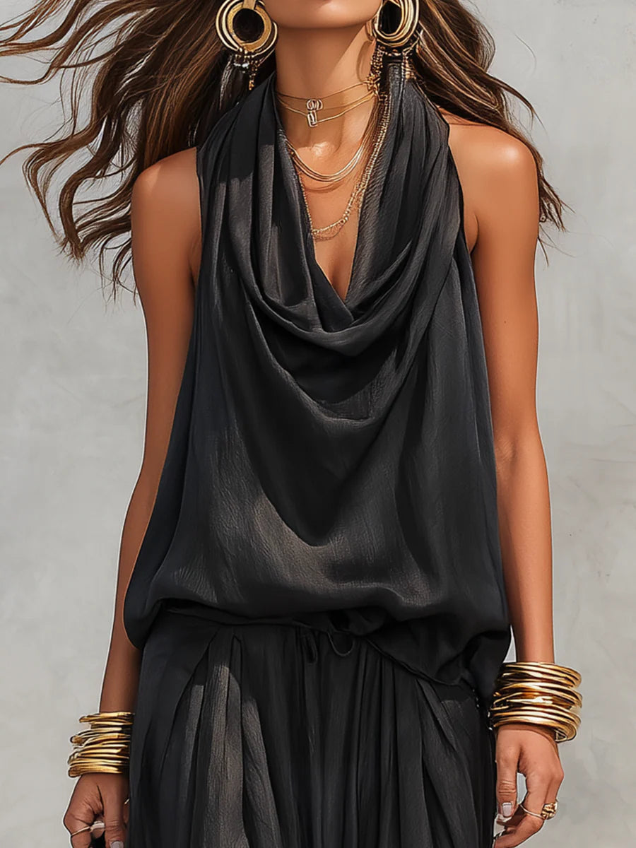 Elegant women's two-piece set, featuring a halter cowl neck top and wide-leg pants. Ideal for casual or dressy events.
