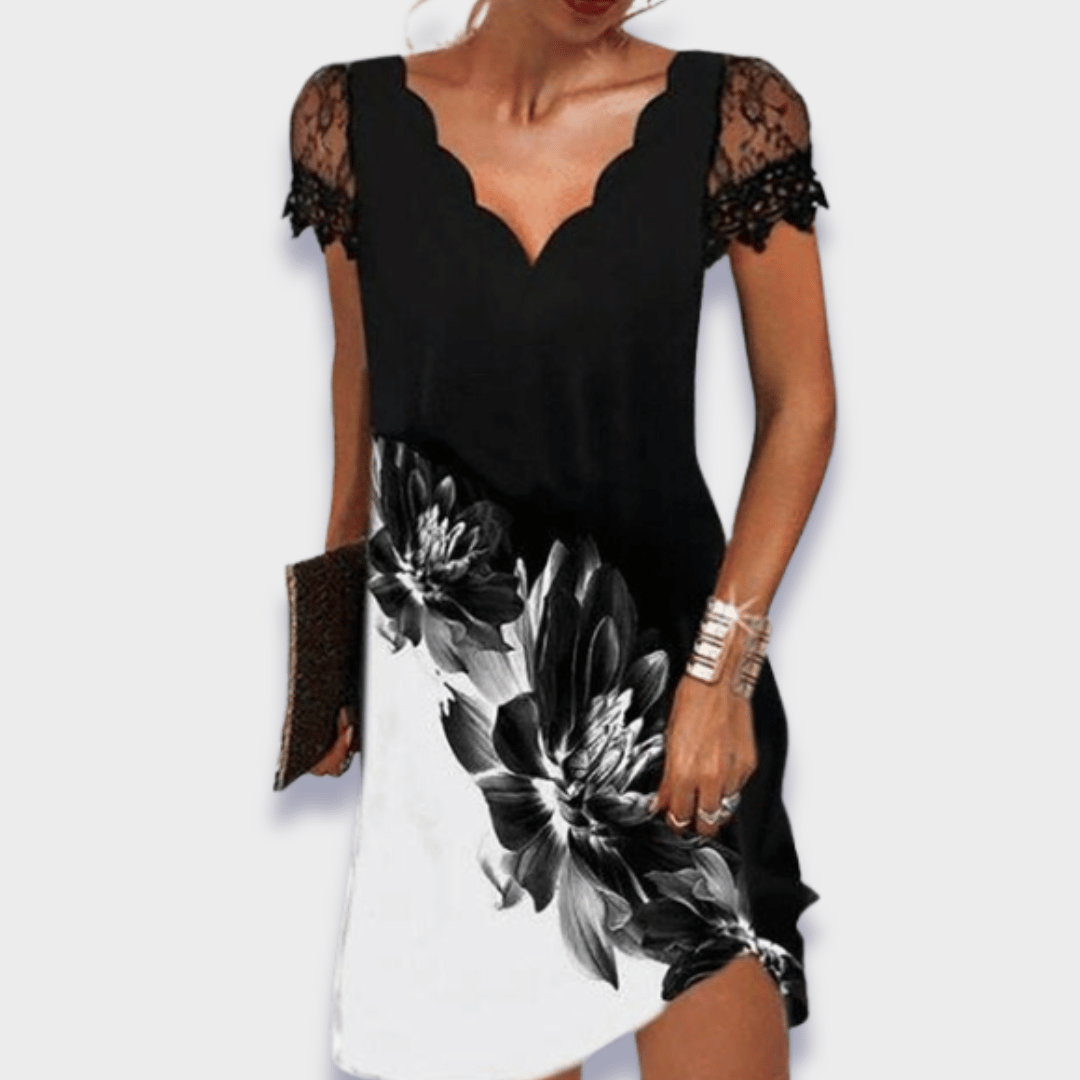 Women's elegant short sleeve lace cocktail dress with a V-neck, perfect for evening events.