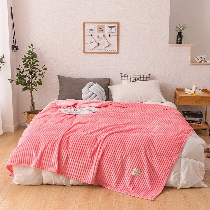 Luxuriously soft flannel blanket, a plush, solid color throw for ultimate warmth and cozy comfort.