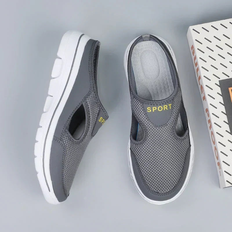 Black men's comfort shoes, orthopedic slip-on, with arch support & cushioned sole for easy wear.