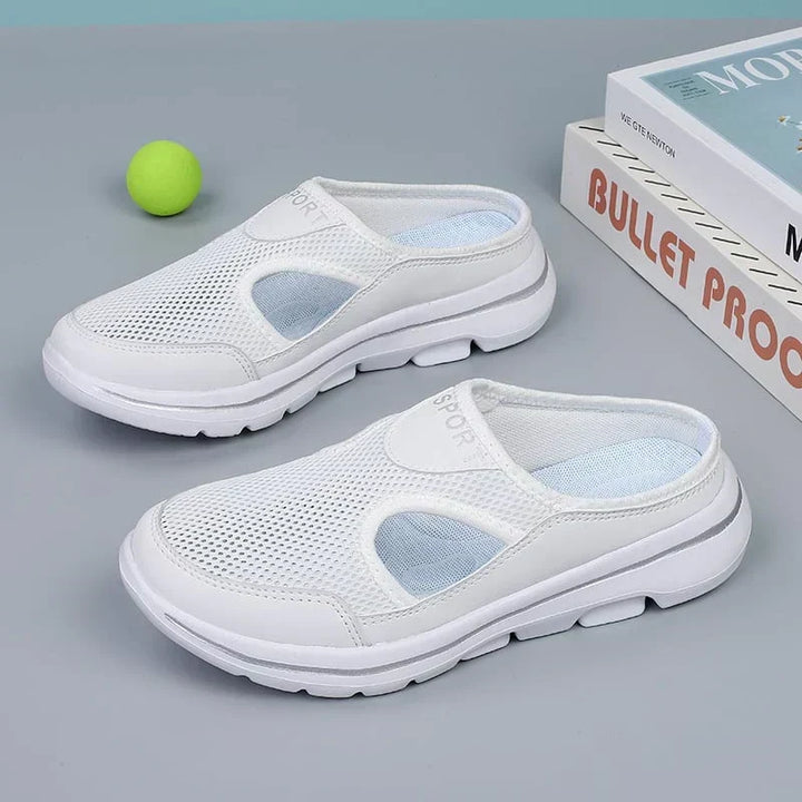 Black men's breathable slip-on comfort shoes, orthopedic, with cushioned sole for relief.