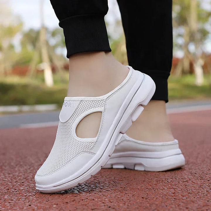 White men's breathable orthopedic slip-on shoes, perfect for foot relief & comfort.