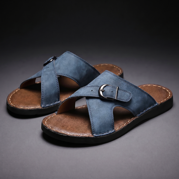 Effortless men's criss-cross strap sandals with adjustable buckles & cushioned sole for comfort.