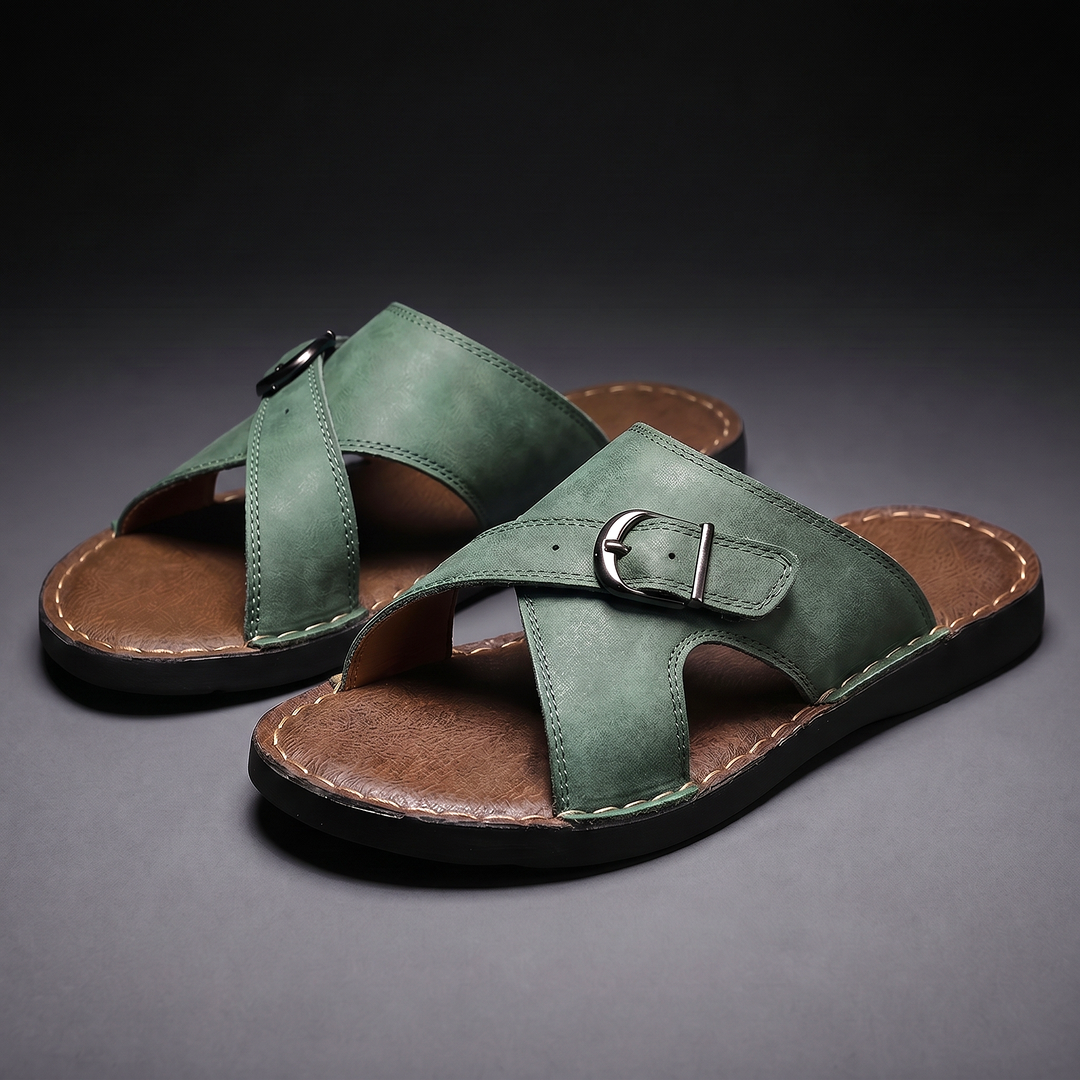 Stylish men's slip-on comfort slides featuring a criss-cross buckle design for relaxed summer wear.