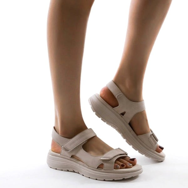 Casual women's flat strap sandals offering supportive orthopedic comfort for summer walking.