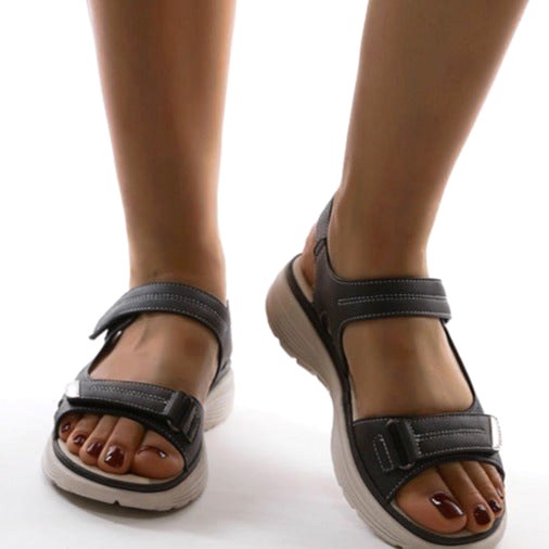 Summer women's flat strap sandals, designed with orthopedic arch support for comfortable casual walking.