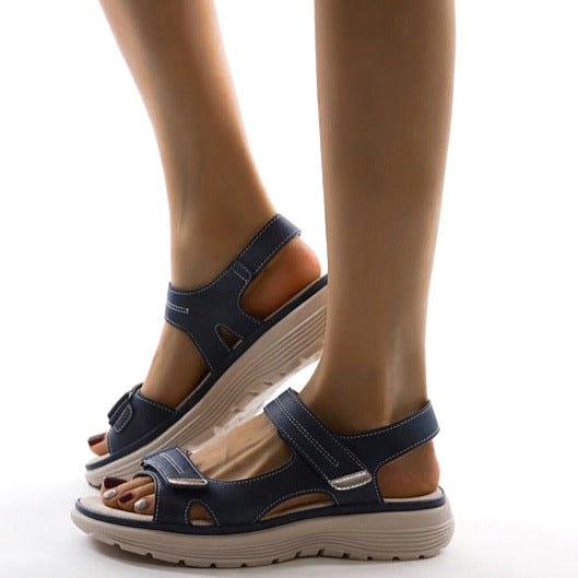 Women's casual flat strap sandals, offering orthopedic support & comfort for walking footwear.