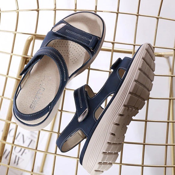 Supportive women's flat strap sandals, perfect orthopedic footwear for comfortable everyday summer walking.