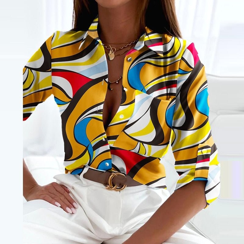 Sophisticated women's printed collared blouse. Classic button-up top, great for professional or casual fashion.