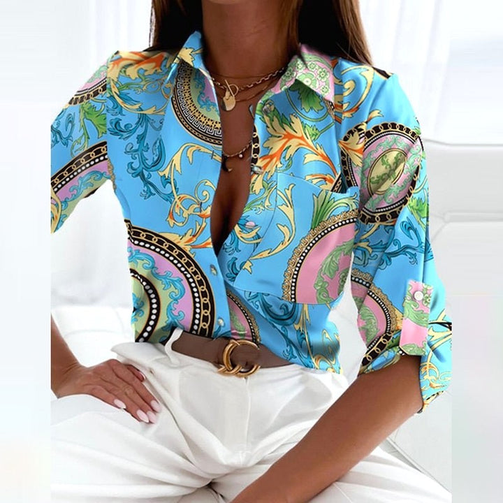 Full view of a women's printed collared blouse, a classic button-up top for modern officewear.