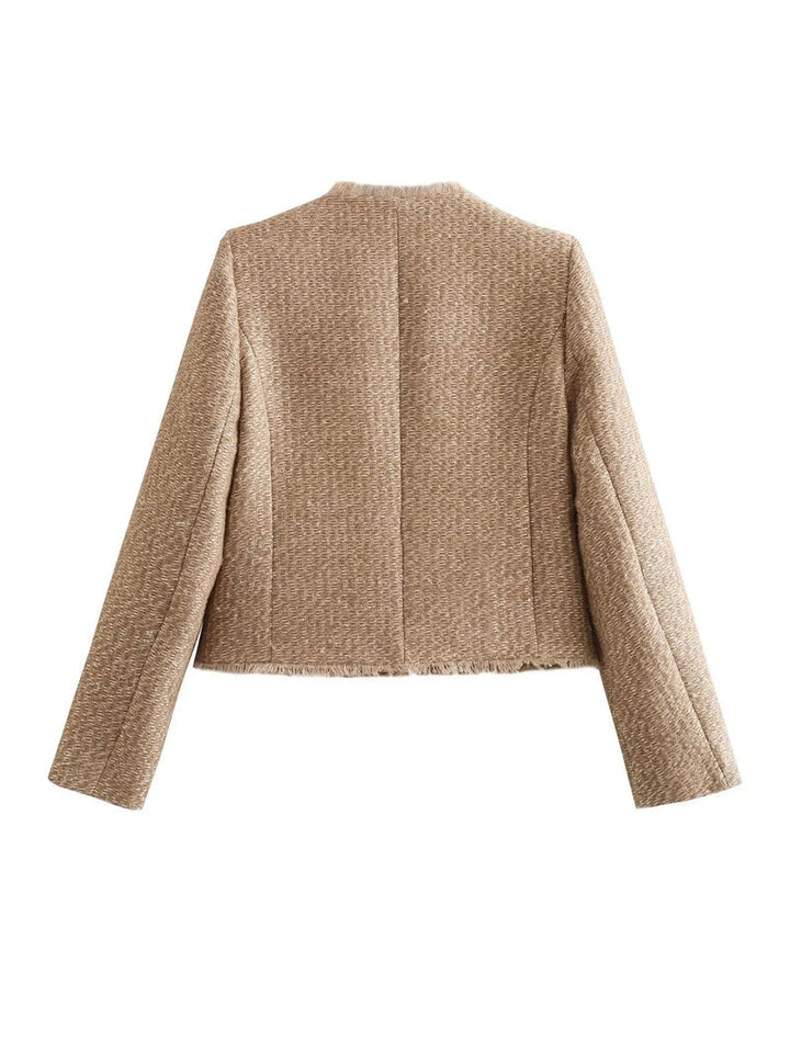 Versatile women's tweed jacket, classic design with gold buttons, ideal for dressy or casual chic.