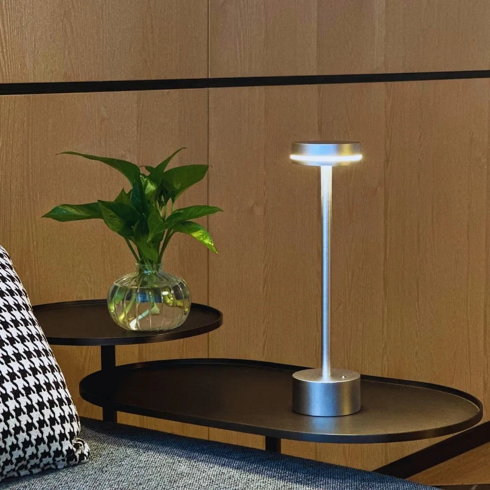 Rechargeable "Unisex Cosmic Elegance" LED lamp, a sleek modern light for any space.
