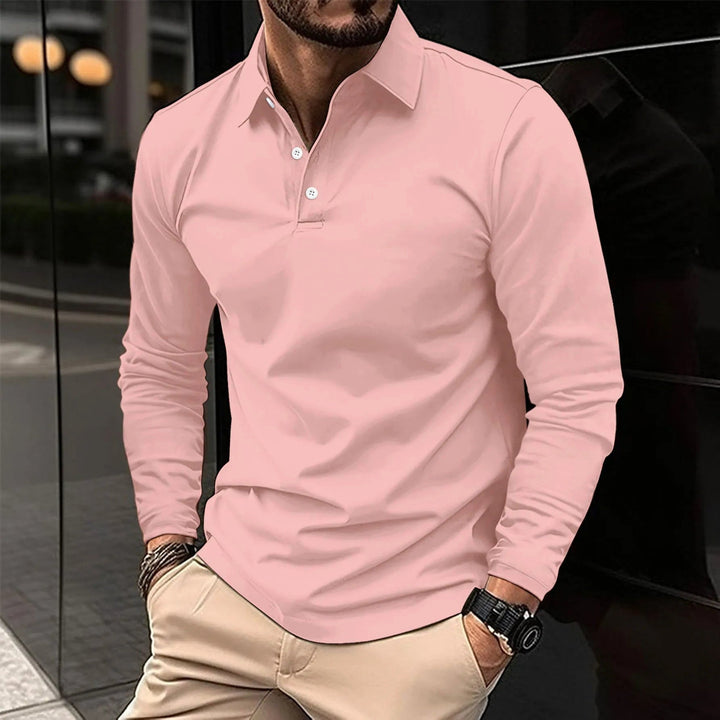 Stylish man in a smart casual long-sleeve polo shirt. Versatile button-up top, ideal for modern men's fashion.