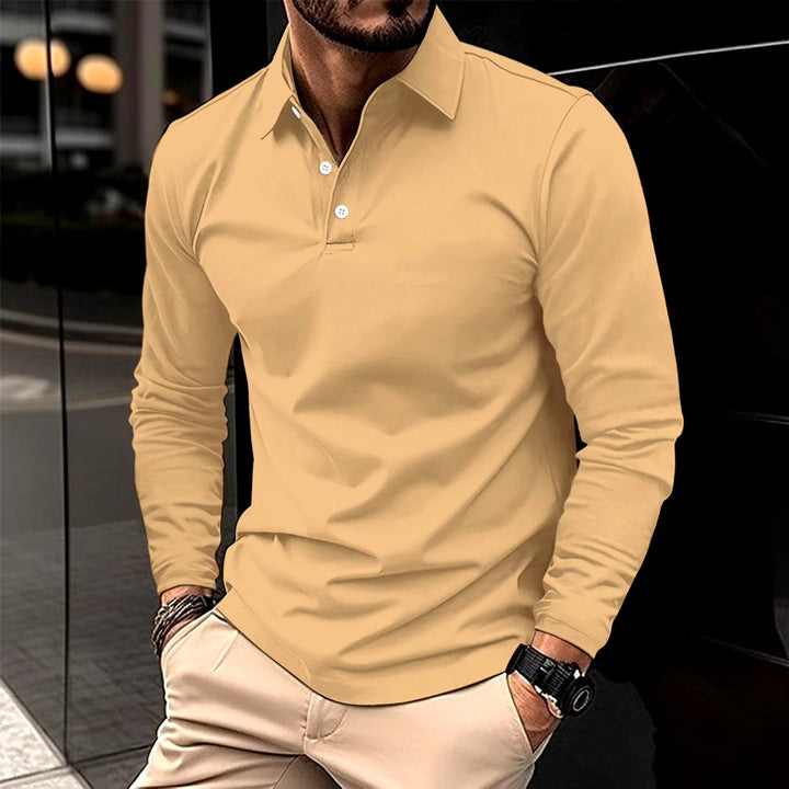 Man in comfortable long-sleeve button-up polo shirt. Versatile smart casual top, perfect for various occasions.