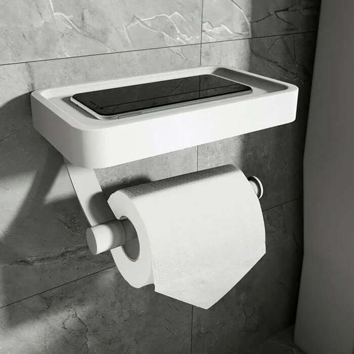 No-drill toilet paper roll holder, space aluminum, integrated storage shelf for bathroom essentials.