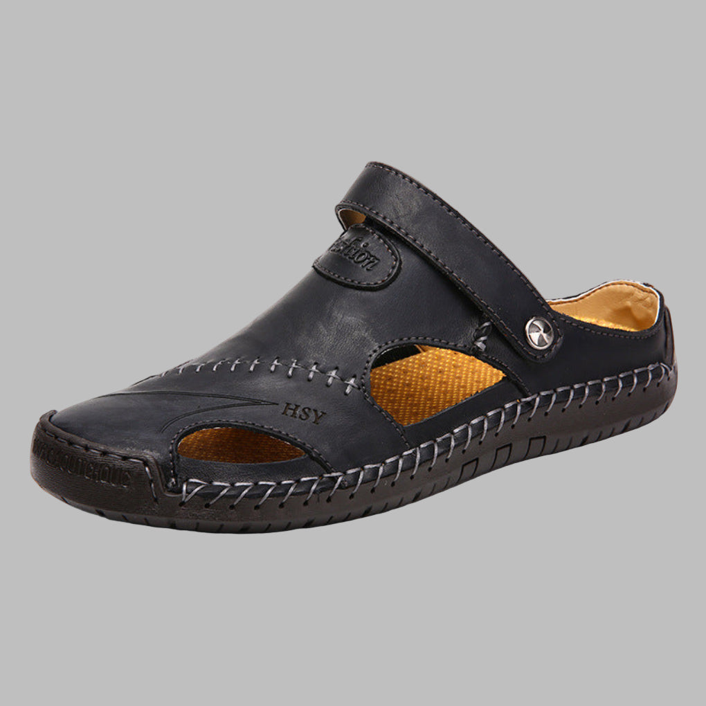 Men's polished stitched slip-on slides for casual summer wear. Comfortable and breathable men's fashion footwear.