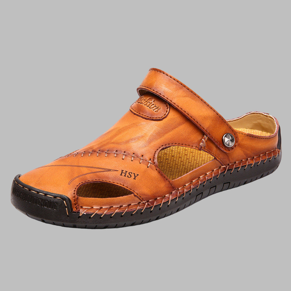 Comfortable men's slip-on slides with a polished finish and elegant stitching. Ideal breathable summer beach wear.