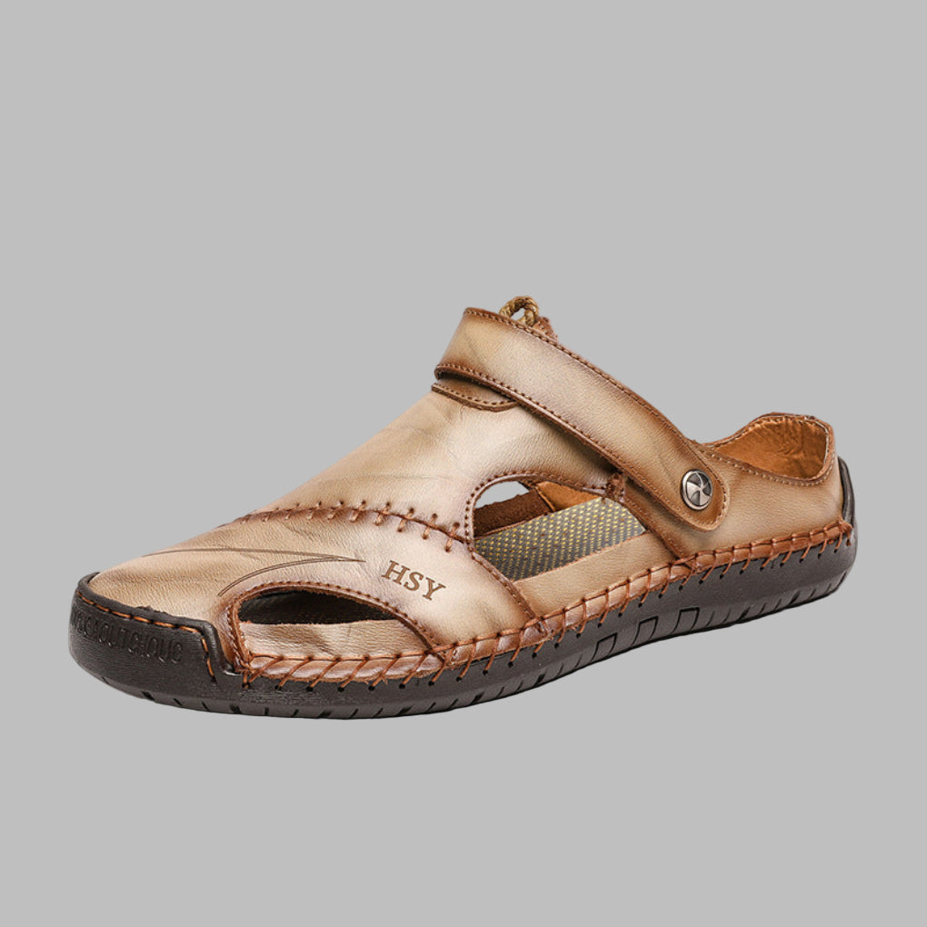 Versatile men's polished slip-on slides, featuring elegant stitching. Comfortable casual summer beach footwear.