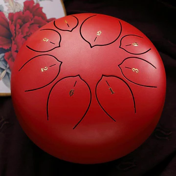 6-inch steel tongue drum for meditation & relaxation. Produces calming, tranquil music for sound healing.