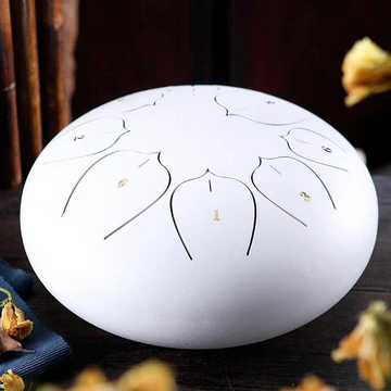 Musical 6-inch steel tongue drum. An easy-play percussion instrument for meditation, yoga, and relaxation sounds.