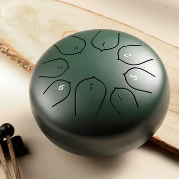 Compact 6-inch steel tongue drum, a versatile instrument for sound healing, meditation, and tranquil relaxation.
