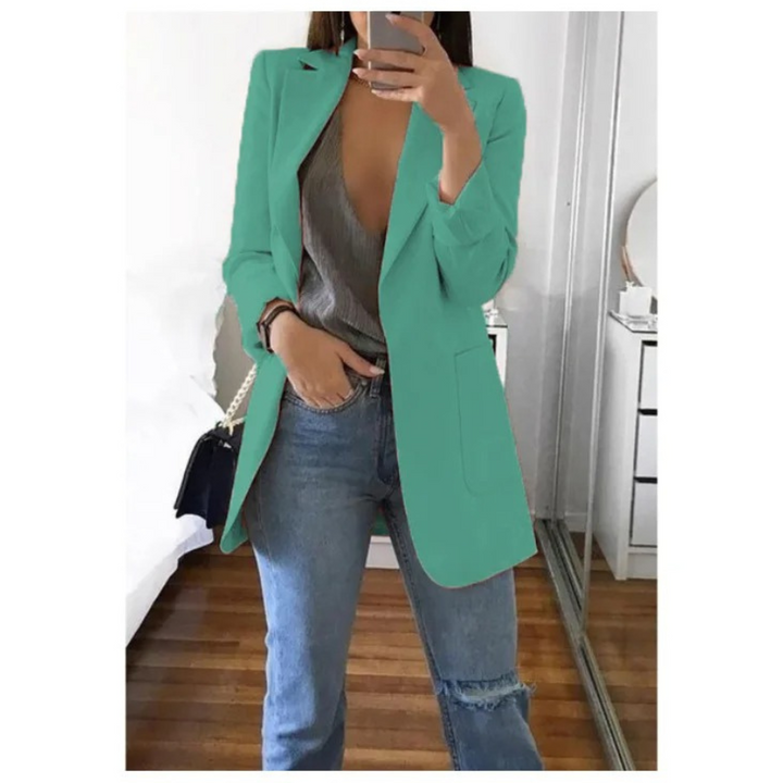 Professional women's long blazer, an elegant and modern workwear essential.