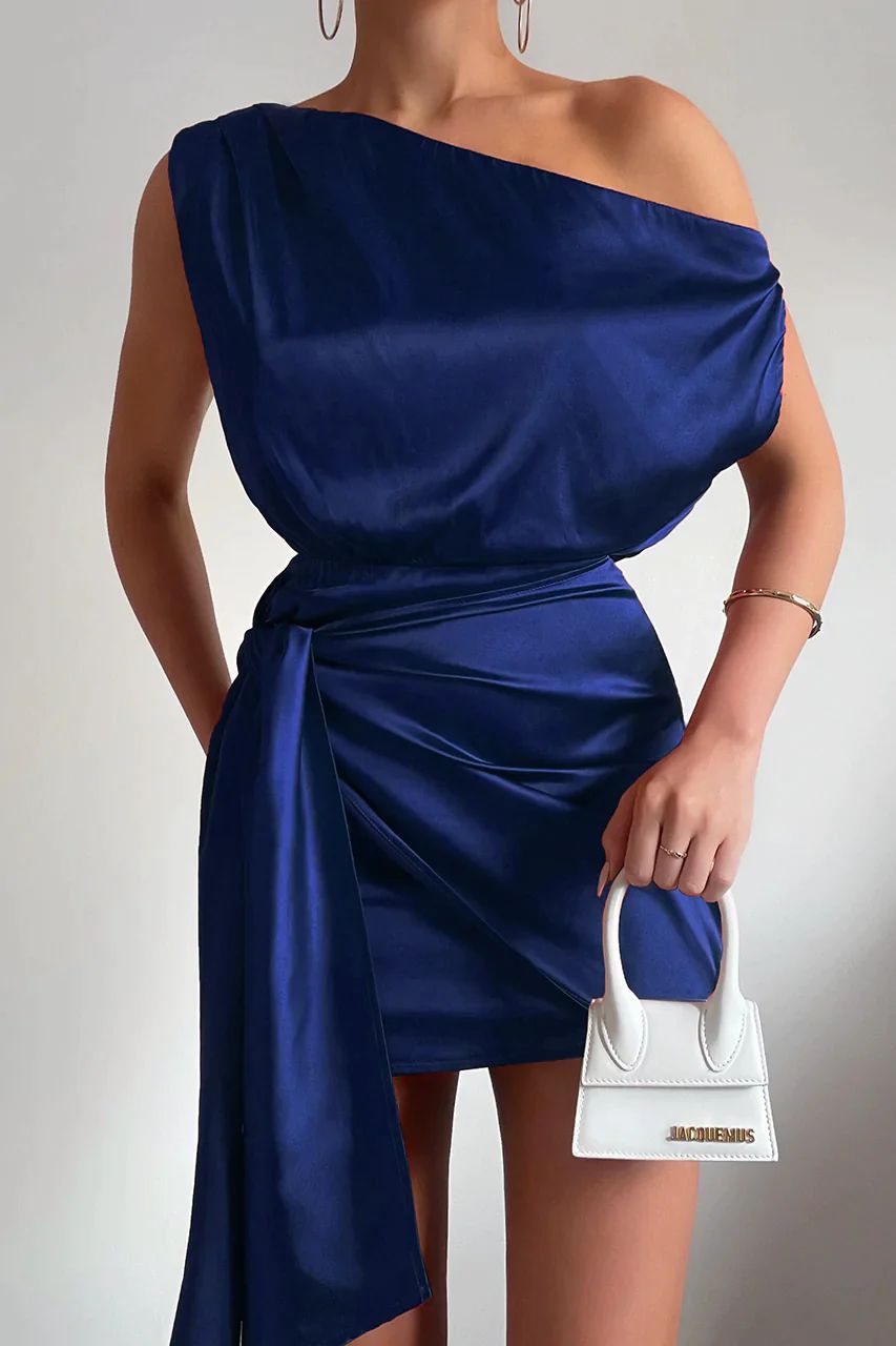 Trendy women's one-shoulder mini dress, perfect for a night out or party. Elegant sleeveless cocktail & club wear.
