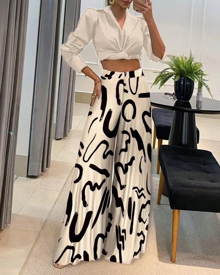 Sara Women's flowy printed wide-leg pants for casual summer style. Trendy, comfortable boho bottom.