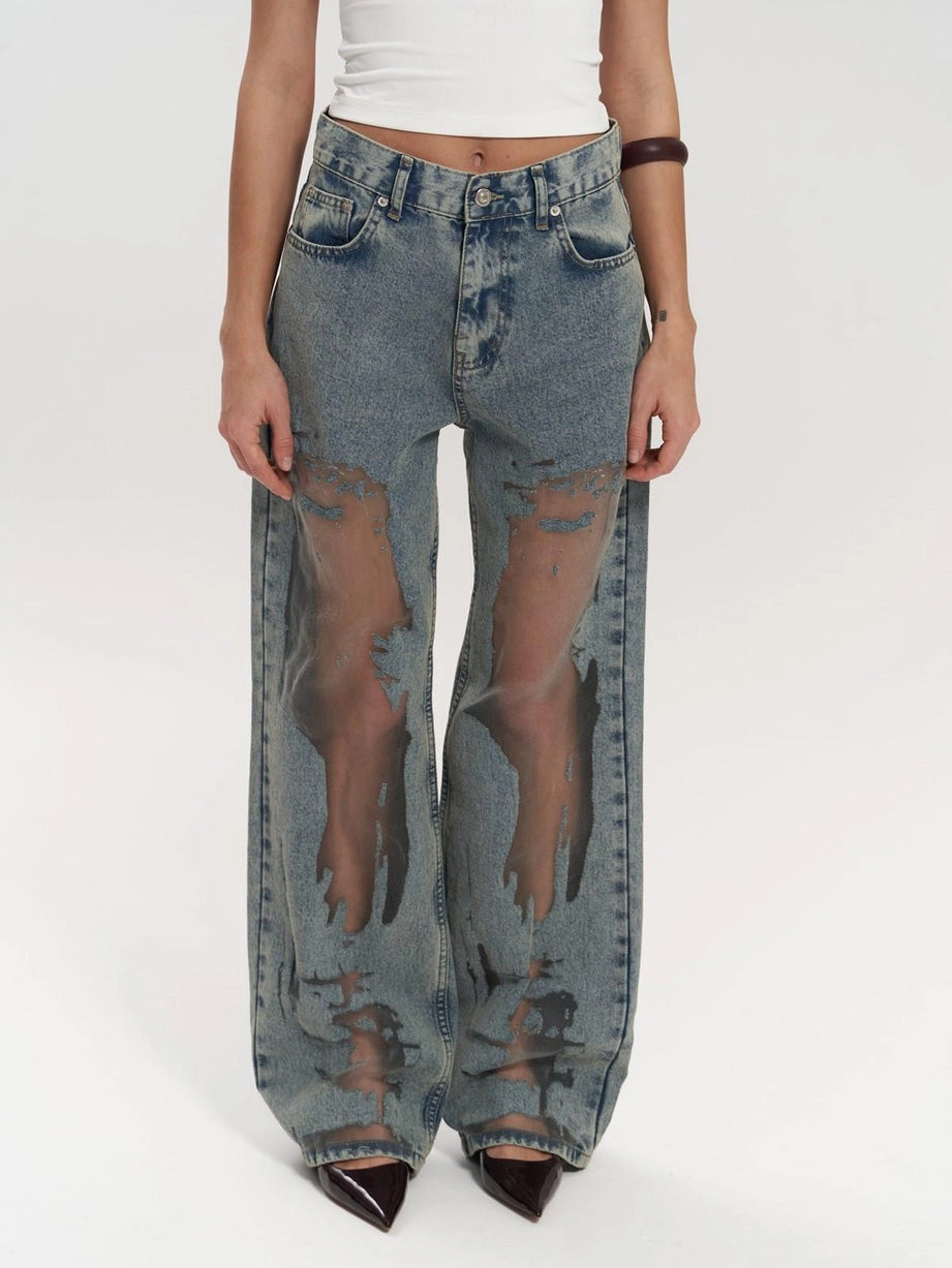 Trendy women's high waist wide leg jeans with chic mesh panels, perfect for fashion-forward casual wear.