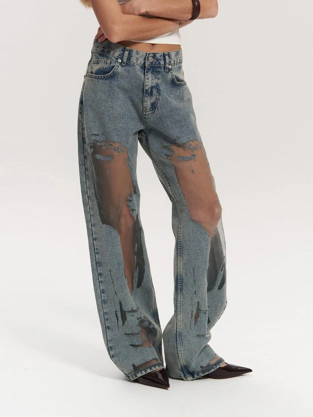 Fashionable women's high waist wide leg jeans with mesh panels, offering a trendy design for everyday style.
