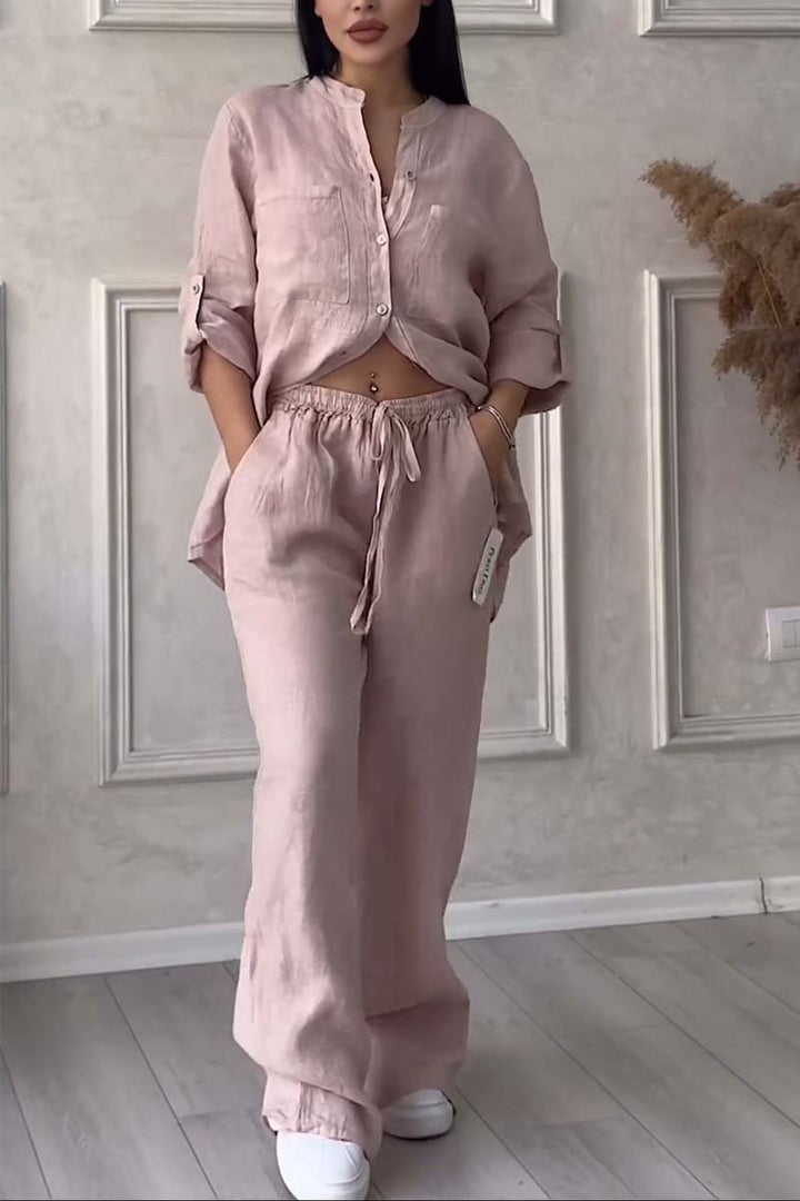 Casual chic women's linen set. Flowy blouse & wide-leg pants for travel, leisure, and summer fashion.