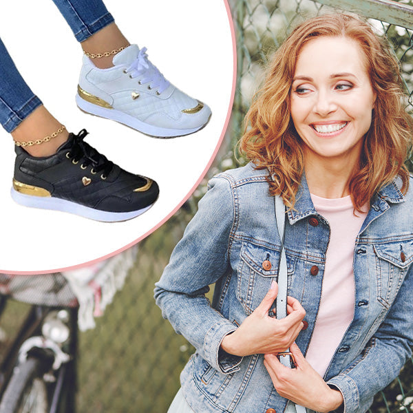 White Isla women's trendy sneakers offering sporty comfort. Lightweight and stylish footwear for active daily wear.
