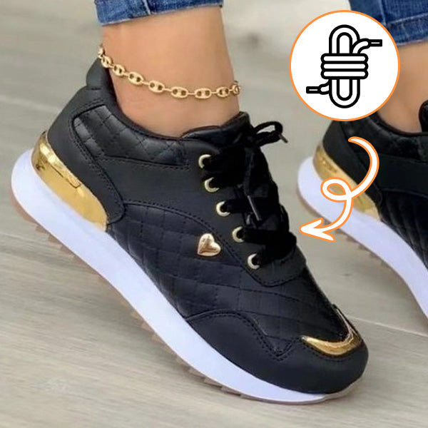 Black Isla women's casual sneakers with a supportive contoured sole. Trendy sporty comfort for everyday style.