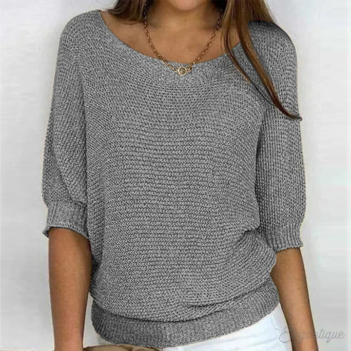 Stylish women's elegant textured sweater. A comfortable, long-sleeve top, key for autumn fashion.