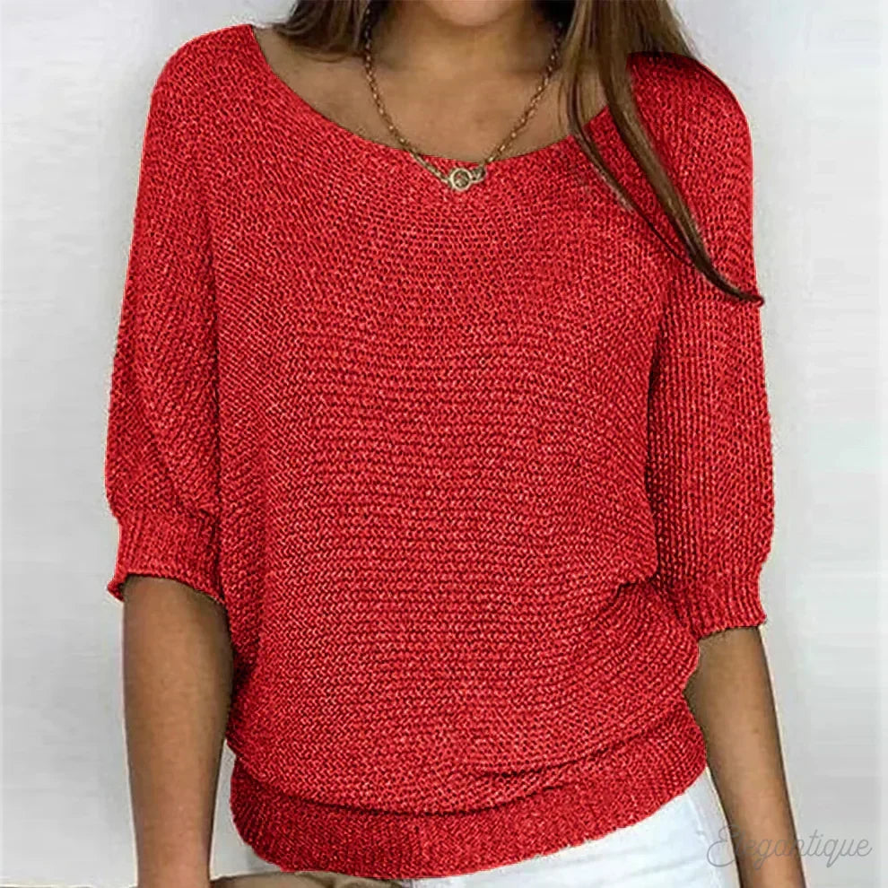 Full-body shot of women's elegant textured sweater. Versatile, cozy, long-sleeve top for autumn fashion.