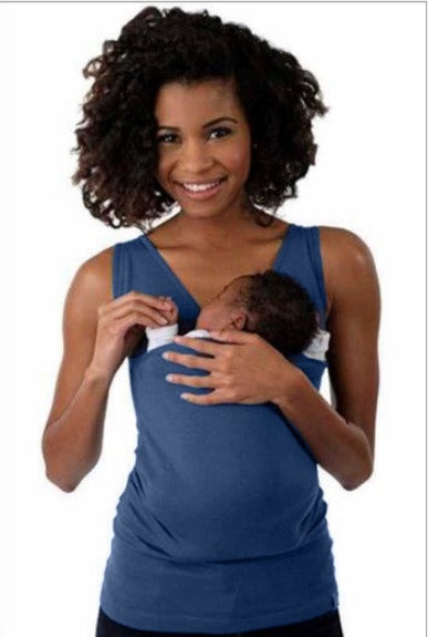 Newborn nestled securely in a unisex babywearing T-shirt, offering ergonomic support & hands-free convenience.