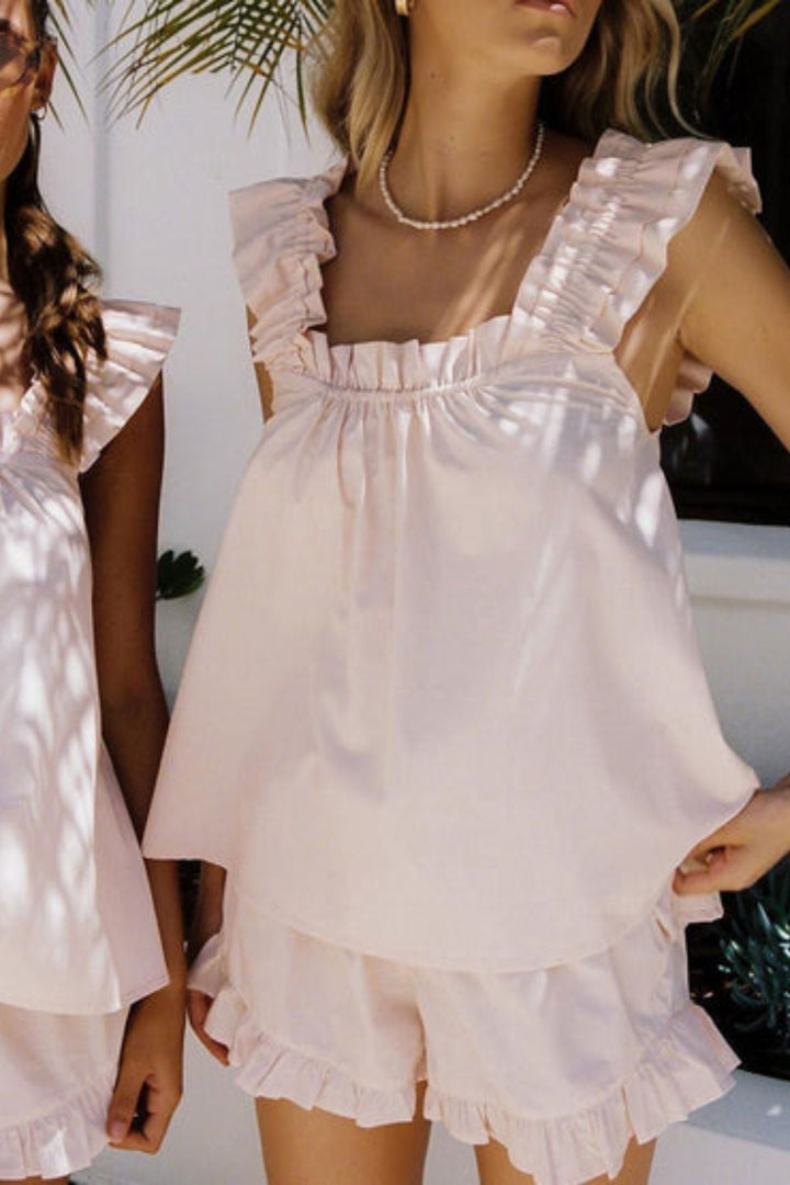Sleeveless ruffle top & comfy shorts in a lightweight women's pajama set. Great for summer lounging.