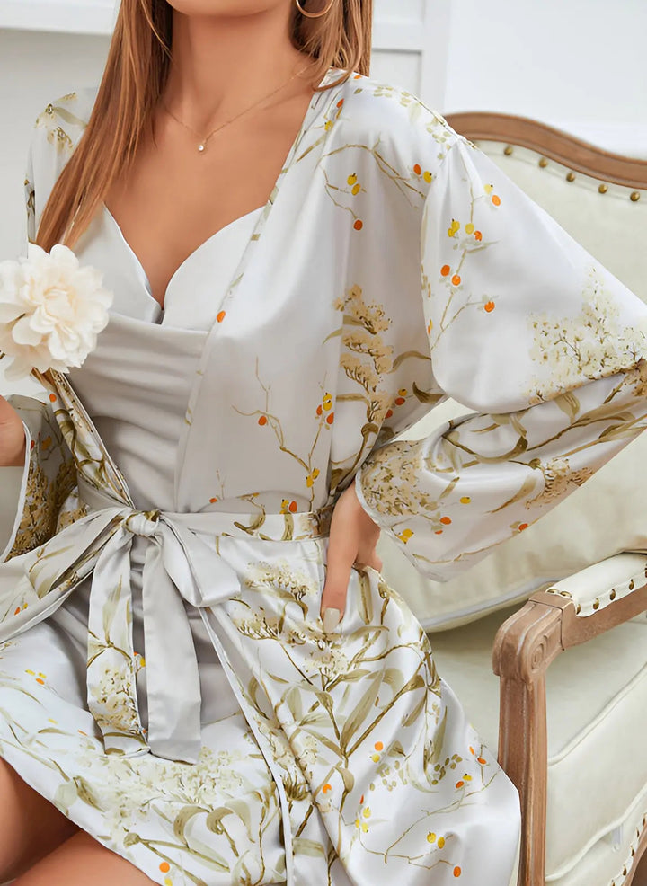 Elegant women's silky nightwear set, a perfect gift of comfort with a stylish kimono robe and matching satin slip dress.