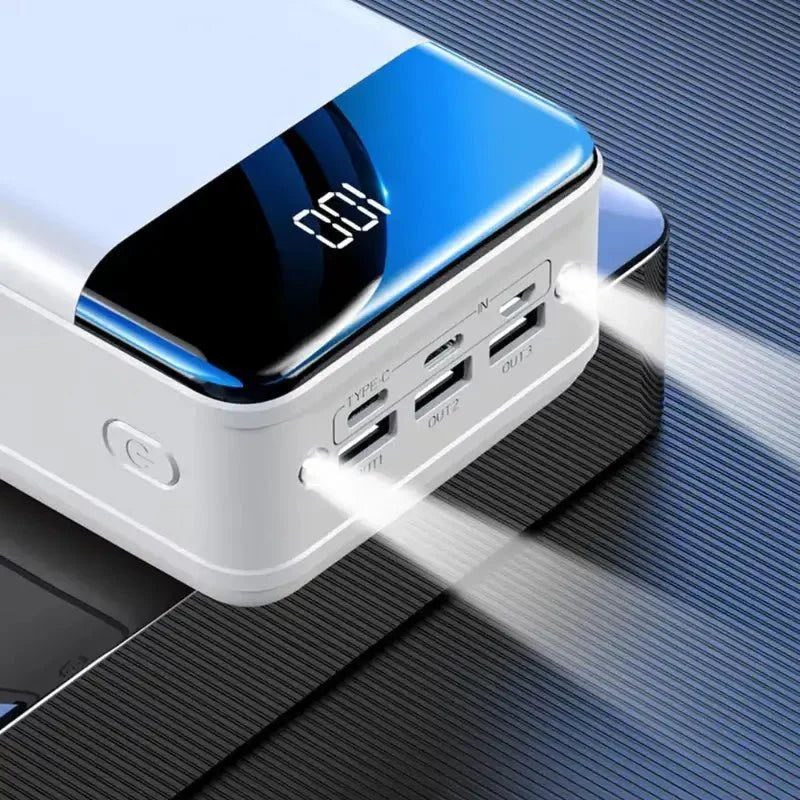 Sleek 50000mAh portable power bank, a must-have travel accessory for universal mobile device charging on-the-go.