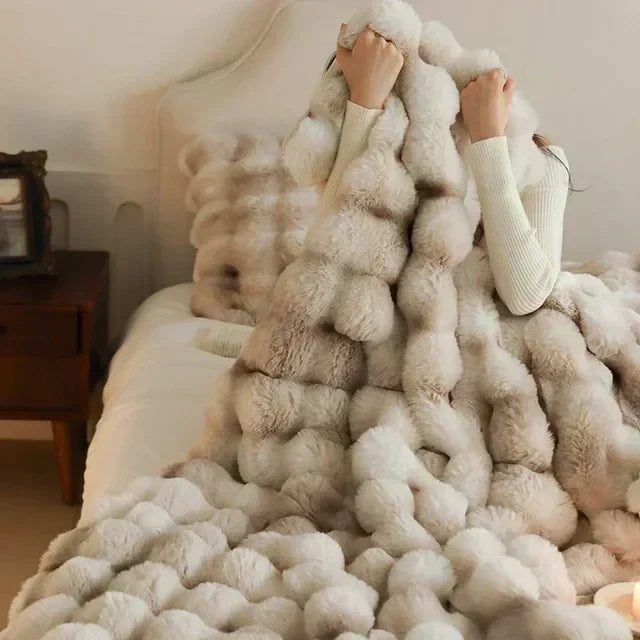 Plush faux fur throw blanket, perfect for travel and home use
