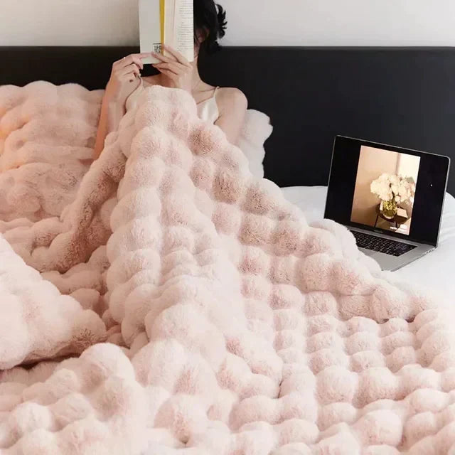 Experience luxury home decor with this soft, fluffy faux fur throw