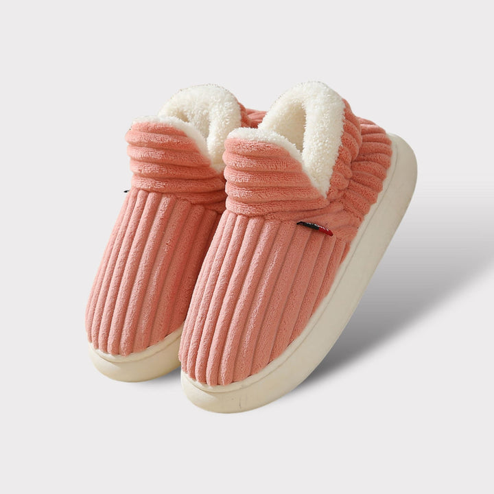 Cozy winter slippers featuring soft fur and an ergonomic design for ultimate relaxation.